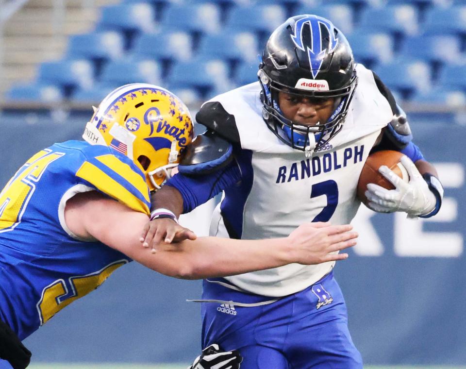 Randolph's Sebastian Jouissance carries the football during the Division 8 Super Bowl at Gillette Stadium versus Hull on Wednesday, Dec. 1, 2021.