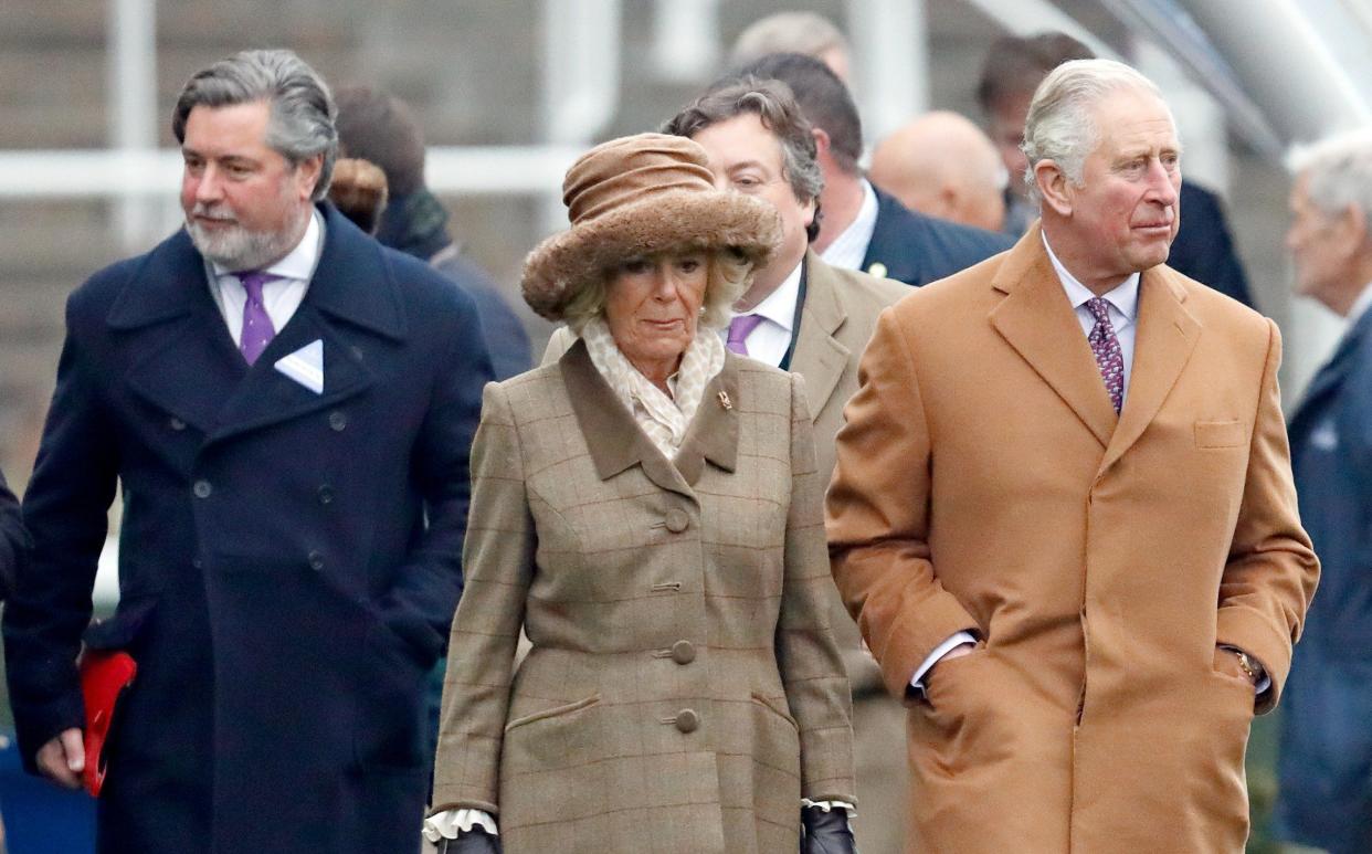 Fawcett, left, with the Prince of Wales and the Duchess of Cornwall in 2018 - GETTY IMAGES