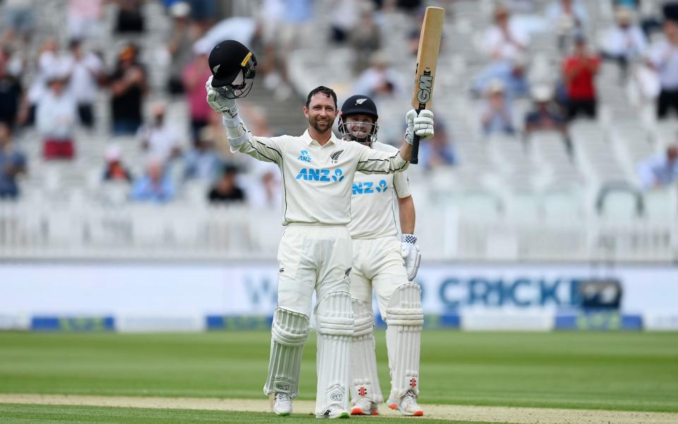  Devon Conway of New Zealand celebrates reaching his century with Henry Nicholls during Day 1 of the First LV= Insurance Test Match between England and New Zealand at Lord's Cricket Ground on June 02, 2021 in London, England - Gareth Copley - ECB /ECB 