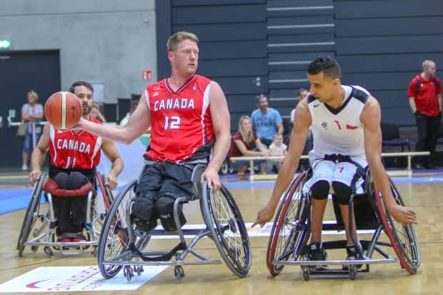 Canadian Patrick Anderson, centre, struck gold with Canada at the Sydney Olympics, Athens Games, and London Olympics, in addition to winning silver at the 2008 Beijing Games. (Wheelchair Basketball Canada - image credit)