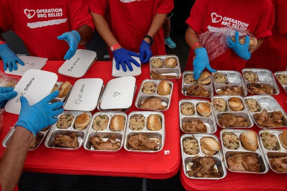 Volunteers pack up meals during Hurricane Florence efforts.