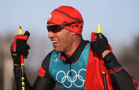 Cross-Country Skiing – Pyeongchang 2018 Winter Olympics – Men's 15km Free – Alpensia Cross-Country Skiing Centre – Pyeongchang, South Korea – February 16, 2018 - Pita Taufatofua of Tonga reacts. REUTERS/Carlos Barria