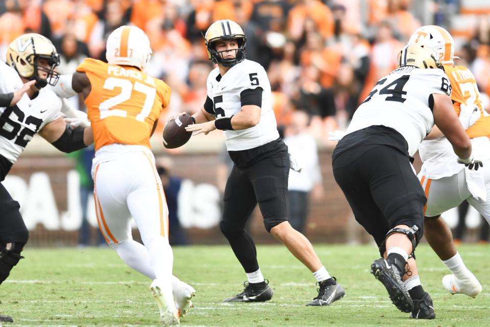 Vanderbilt quarterback AJ Swann (5) looks to pass the ball during a football game between Tennessee and Vanderbilt at Neyland Stadium in Knoxville, Tenn., on Saturday, Nov. 25, 2023. Credit: Saul Young/News Sentinel-USA TODAY NETWORK