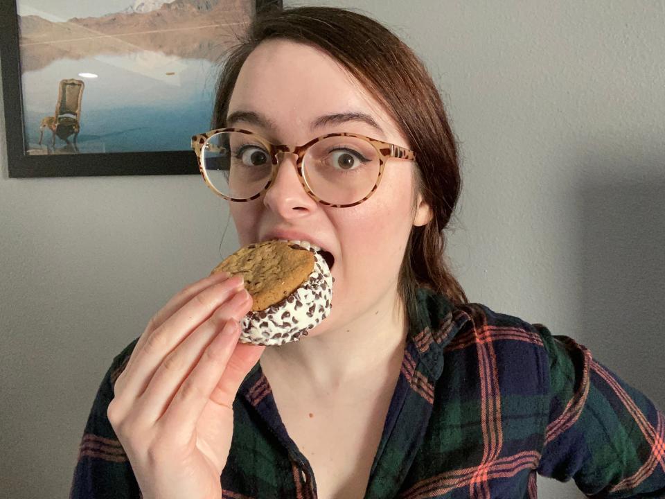 The writer takes a bite of a Sublime ice-cream sandwich