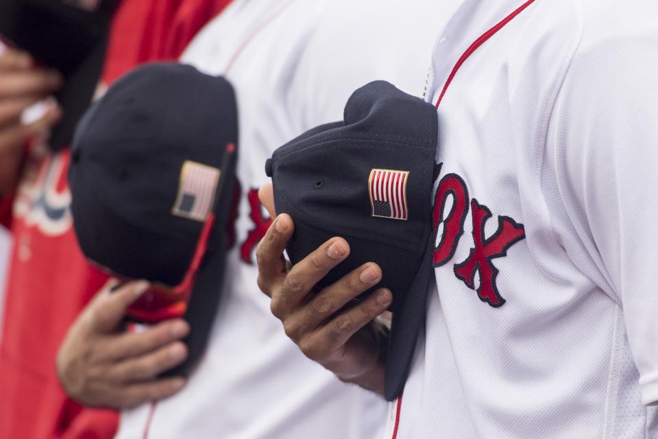 An American flag patch is shown on a cap before a game between the Boston Red Sox and the Tampa Bay Rays on September 10, 2017 at Fenway Park in Boston, Massachusetts. (Photo by Billie Weiss/Boston Red Sox/Getty Images)