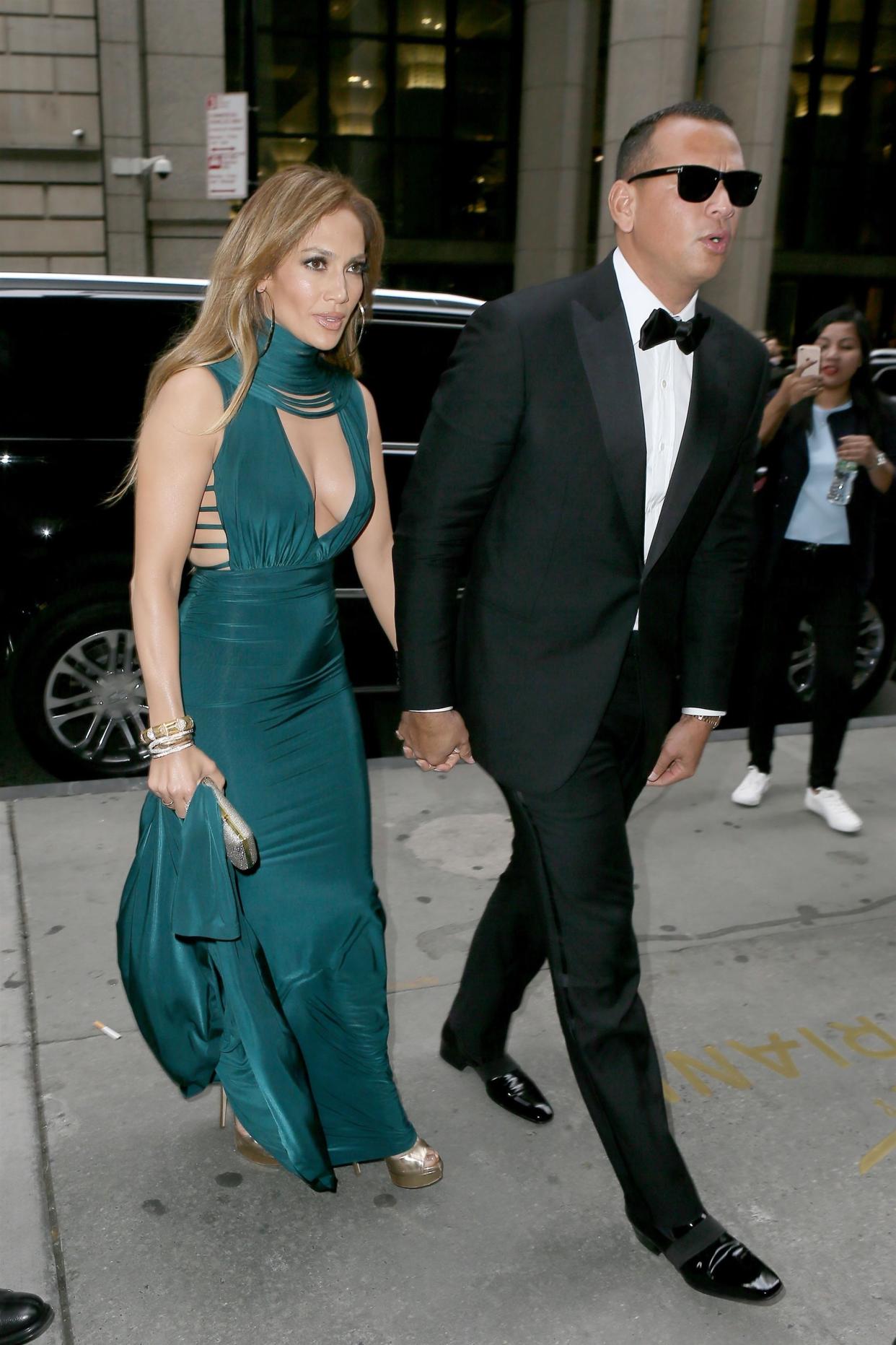 New York, NY  - Couple Jennifer Lopez and Alex Rodriguez show off their style as they are spotted heading into friends wedding at Cipriani's Wall Street in New York. Jennifer was rocking a teal gown as Alex was sporting a black tuxedo.  Pictured: Jennifer Lopez, Alex Rodriguez  BACKGRID USA 6 AUGUST 2017   USA: +1 310 798 9111 / usasales@backgrid.com  UK: +44 208 344 2007 / uksales@backgrid.com  *UK Clients - Pictures Containing Children Please Pixelate Face Prior To Publication*