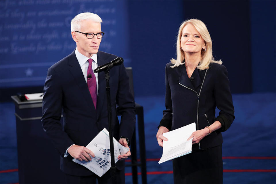 In 2016, Cooper became the first publicly out gay man to moderate a presidential debate. He’s seen here with fellow moderator Martha Raddatz, of ABC.