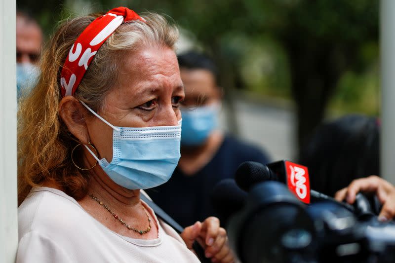 Rosibel Emerita Arriaza, mother of Victoria Salazar Arriaza, speaks with the media in San Salvador