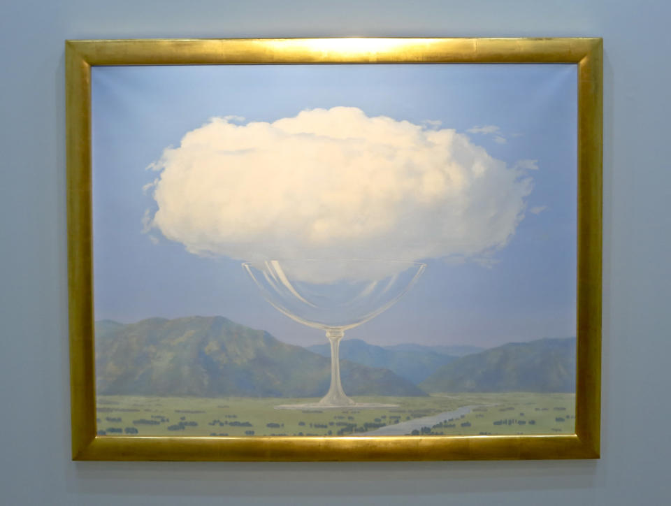 One of the largest and most unusual paintings by surrealist master Rene Magritte is shown at New York's Christie's auction house, Monday Feb. 6, 2017. "La Corde Sensible" ("Heartstrings") will be up for sale with an estimated price of 14 million pounds ($17.5 million) in London on Feb. 28. (AP Photo/Bebeto Matthews)