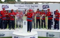 Cricket - England vs South Africa - Third International T20 - The SSE SWALEC, Cardiff, Britain - June 25, 2017 England's Eoin Morgan celebrates with the trophy and team mates at the end of the match Action Images via Reuters/Andrew Boyers