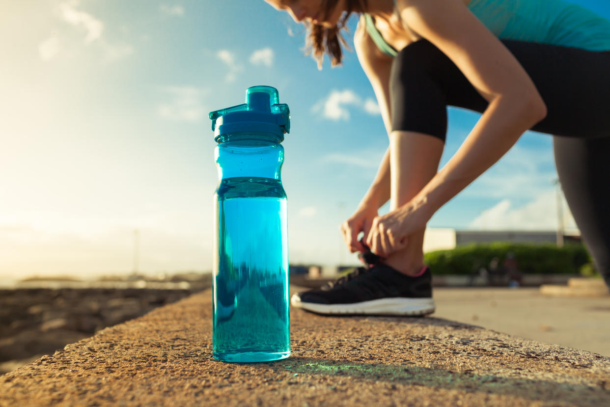 Woman with water bottle