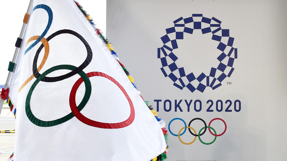 The Olympic flag and logo for the Tokyo 2020 Olympics, pictured here at the official flag arrival ceremony.