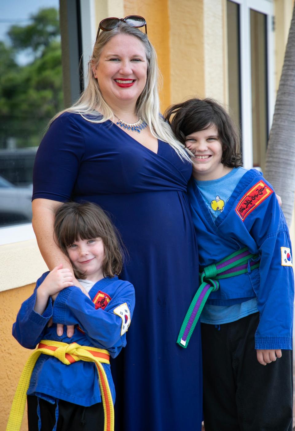 Cindy Banyai with her children, J.T., 10, and Evie, 6, on Tuesday, Aug. 22, 2023, in Fort Myers. Banyai wonders if her daughter's blood disease as an infant was caused by ethylene oxide from American Contract Systems.