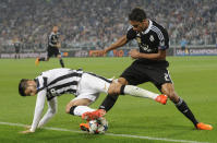 Football - Juventus v Real Madrid - UEFA Champions League Semi Final First Leg - Juventus Stadium, Turin, Italy - 5/5/15 Real Madrid's Raphael Varane in action with Juventus' Alvaro Morata Reuters / Giorgio Perottino