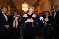 Italian Premier Giorgia Meloni arrives for the premiere of Modest Mussorgsky's Boris Godunov in Milan, Italy, Wednesday, Dec. 7, 2022. Italy’s most famous opera house, Teatro alla Scala, opened its new season Wednesday with the Russian opera “Boris Godunov,” against the backdrop of Ukrainian protests that the cultural event is a propaganda win for the Kremlin during Russia’s invasion of Ukraine. (AP Photo/Antonio Calanni)