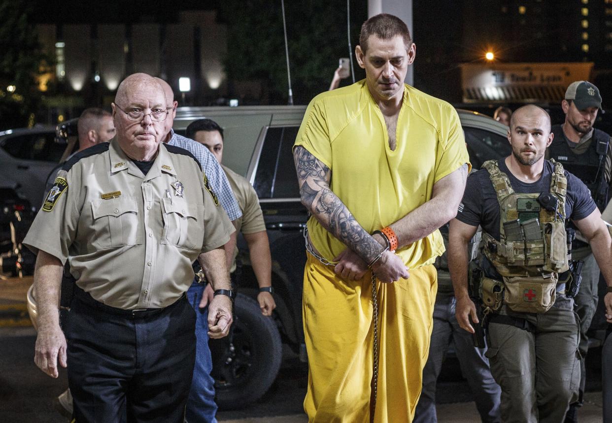 FILE - Escaped inmate Casey White arrives at the Lauderdale County Courthouse in Florence, Ala., after waiving extradition in Indiana, on May 10, 2022. 