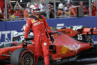 Ferrari driver Charles Leclerc of Monaco steers his racer celebrates after setting the pole position at the end of the qualifying session practice at the 'Sochi Autodrom' Formula One circuit, in Sochi, Russia, Saturday, Sept.28, 2019. The Formula one race will be held on Sunday. (AP Photo/Luca Bruno)