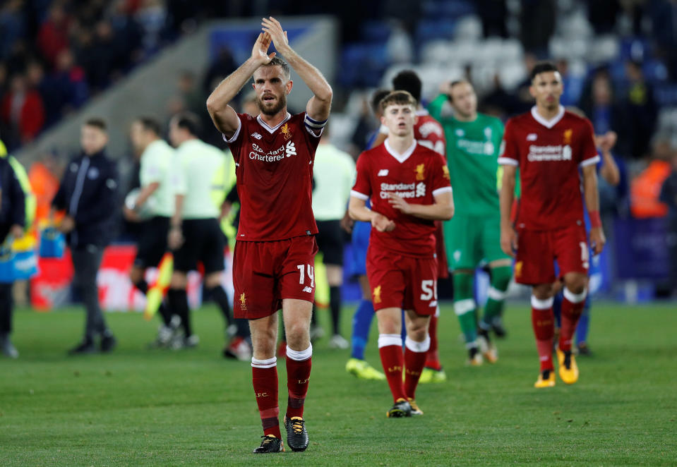 Liverpool’s Jordan Henderson looks dejected