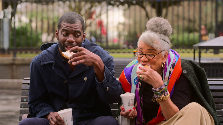 Stephen Satterfield and Jessica B. Harris eating