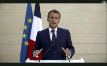 In this image made from UNTV video, French President Emmanuel Macron speaks in a pre-recorded message which was played during the 75th session of the United Nations General Assembly, Tuesday, Sept. 22, 2020, at UN headquarters in New York. The U.N.'s first virtual meeting of world leaders started Tuesday with pre-recorded speeches from some of the planet's biggest powers, kept at home by the coronavirus pandemic that will likely be a dominant theme at their video gathering this year. (UNTV via AP)