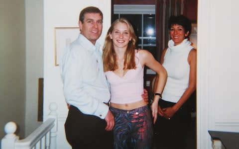 The teenager with Prince Andrew and Ghislaine Maxwell at her London home in 2001 - Credit: Virginia Roberts