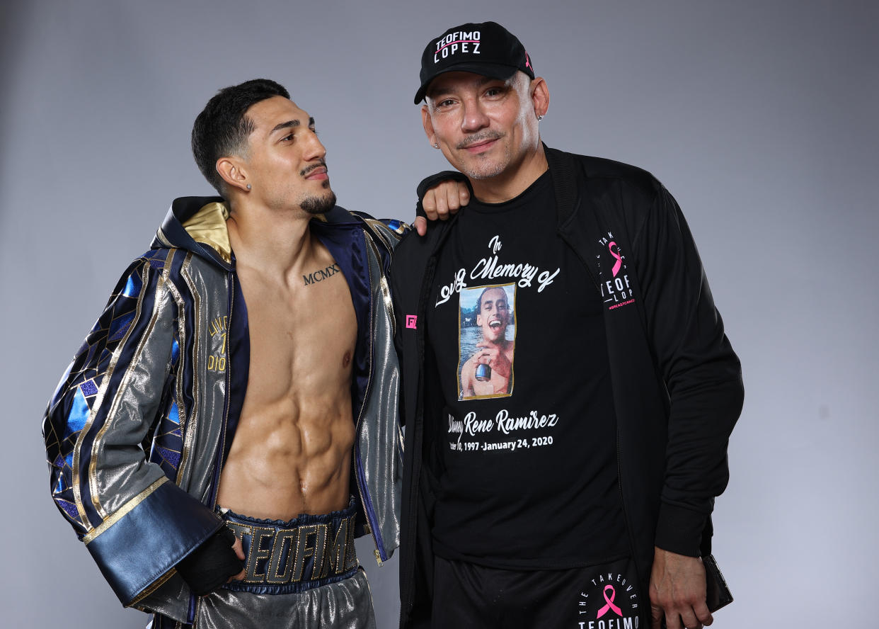 LAS VEGAS, NEVADA - OCTOBER 16: American professional boxer Teófimo López and his father Teofimo Lopez Sr. pose for a portrait on October 16, 2020 in Las Vegas, Nevada. (Photo by Mikey Williams/Top Rank Inc via Getty Images)