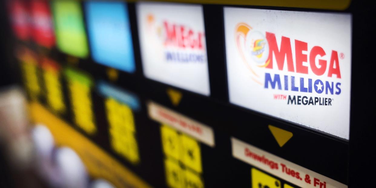 A lottery ticket vending machine offers Mega Millions tickets