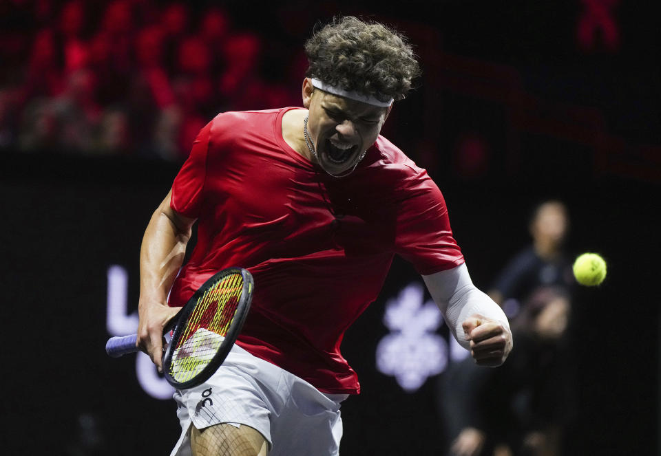 Team World's Ben Shelton celebrates after winning a game against Team Europe's Arthur Fils during the second set of a Laver Cup tennis singles match in Vancouver, British Columbia, Friday, Sept. 22, 2023. (Darryl Dyck/The Canadian Press via AP)