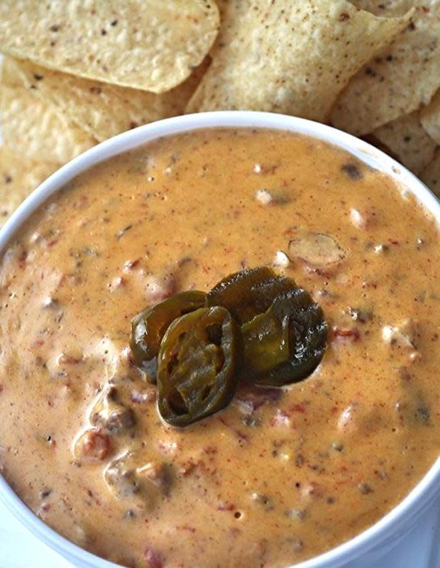 <p>Krista Marshall</p><p>This will be the dip everyone at your Cinco de Mayo party will keep coming back to for more.</p><p><strong>Get the recipe: <a href="https://parade.com/842255/kristamarshall/crock-pot-spicy-beef-queso/" rel="nofollow noopener" target="_blank" data-ylk="slk:Crock Pot Spicy Beef Queso;elm:context_link;itc:0;sec:content-canvas" class="link ">Crock Pot Spicy Beef Queso</a></strong></p>