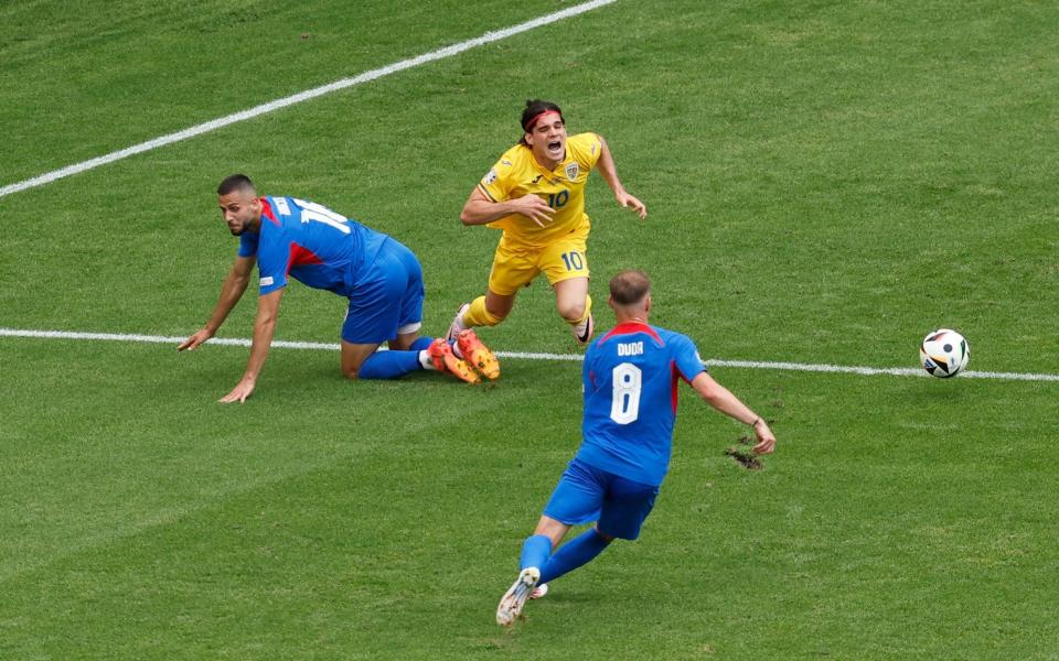 Ianis Hagi is fouled by David Hancko.