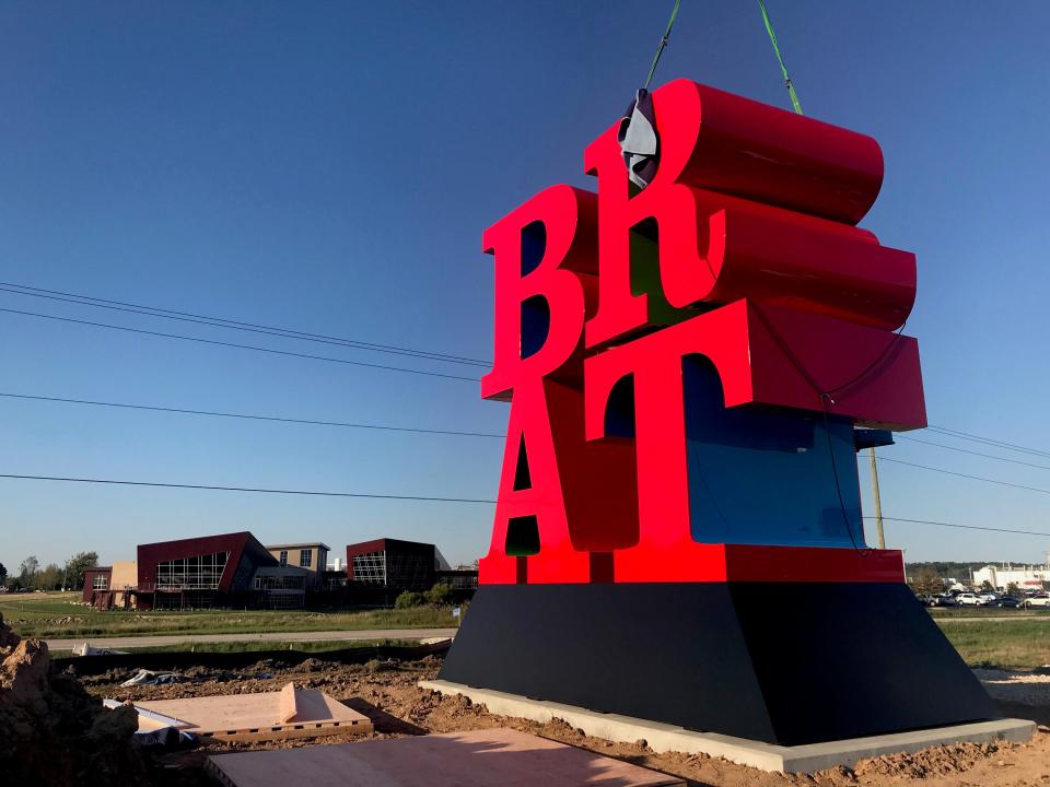 A sculpture spelling out the word BRAT was commissioned by the owners of Johnsonville Sausage and installed at its headquarters in Sheboygan Falls in 2018.