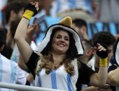 <p>Hope: An Argentinian fan hopes her team can get the first win of the World Cup against Croatia. (AP) </p>