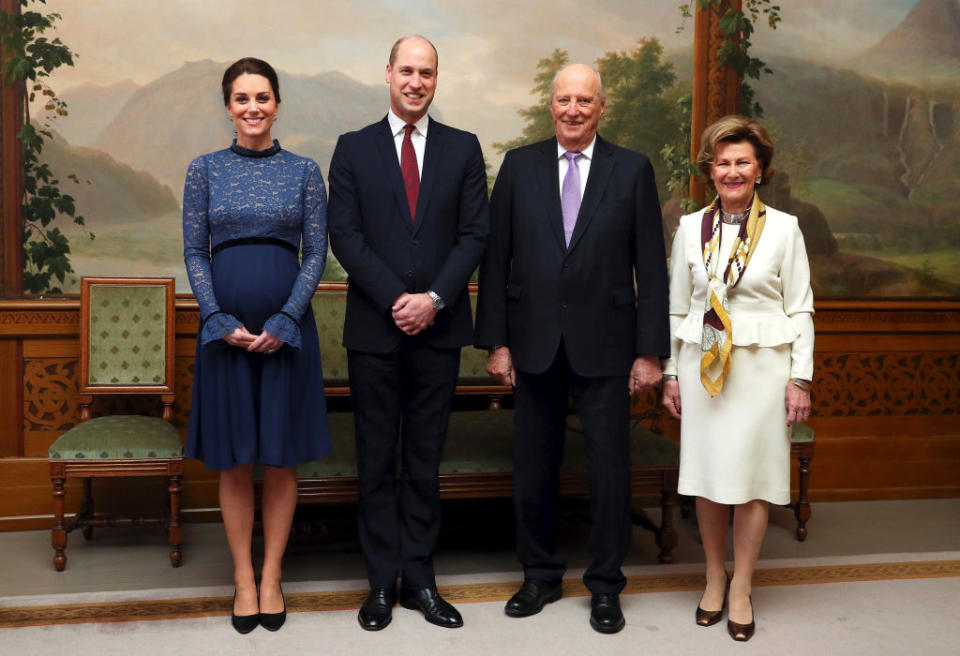 The Duchess of Cambridge dressed her baby bump in a lace dress by Seraphine to meet King Harald and Queen Sonja of Norway [Photo: Getty]