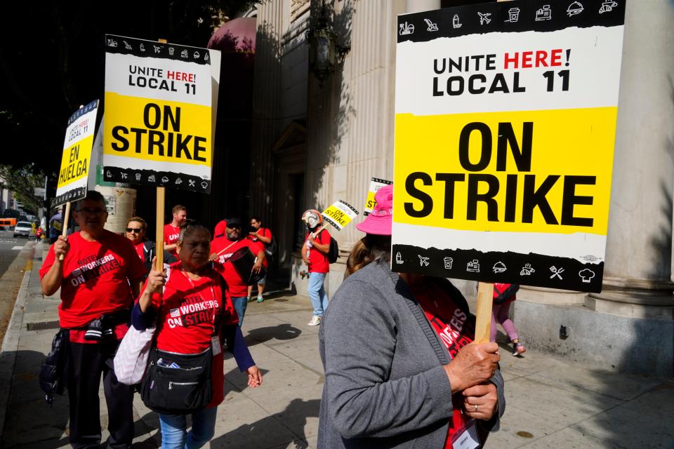 Striking hotel workers picket in front of the Biltmore Hotel in downtown Los Angeles on Monday July 3, 2023, demanding better pay and benefits. The workers began striking Sunday.