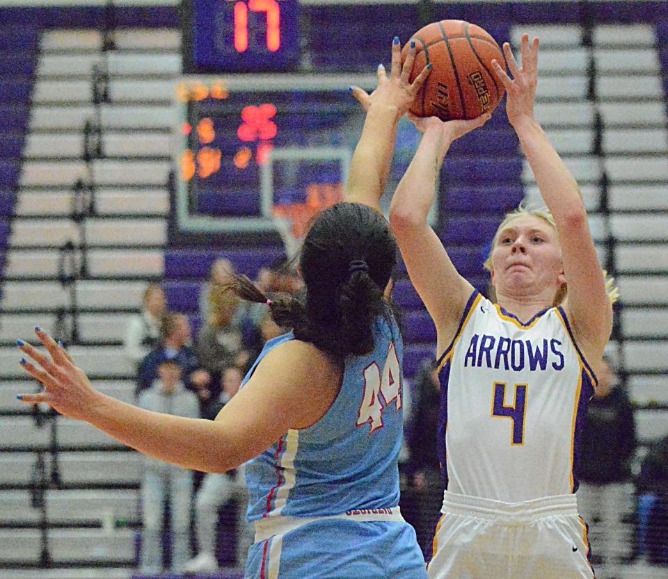 Watertown senior guard Maddy Rohde shoots over Sioux Falls Lincoln's Kierra Lubovich during a high school girls basketball game on Tuesday, Jan. 31, 2023 in the Watertown Civic Arena. The Arrows host Lincoln again on Friday in a SoDak 16 state-qualifying game.