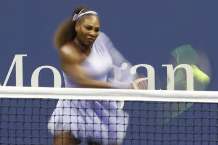 Sep 6, 2018; New York, NY, USA; Serena Williams of the United States hits a backhand against Anastasija Sevastova of Latvia (not pictured) in a women's semi-final match on day eleven of the 2018 U.S. Open tennis tournament at USTA Billie Jean King National Tennis Center. Mandatory Credit: Geoff Burke-USA TODAY Sports