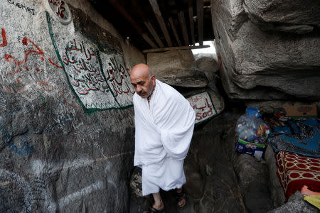 A Muslim pilgrim from Turkey visits the Mount Al-Noor, where Muslims believe Prophet Mohammad received the first words of the Koran through Gabriel in the Hera cave, ahead of annual Haj pilgrimage in the holy city of Mecca, Saudi Arabia August 18, 2018. REUTERS/Zohra Bensemra