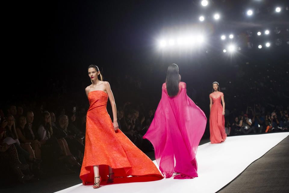 The Monique Lhuillier Spring 2014 collection is modeled during Mercedes-Benz Fashion Week in New York, Saturday, Sept. 7, 2013. (Photo by Charles Sykes/Invision/AP)