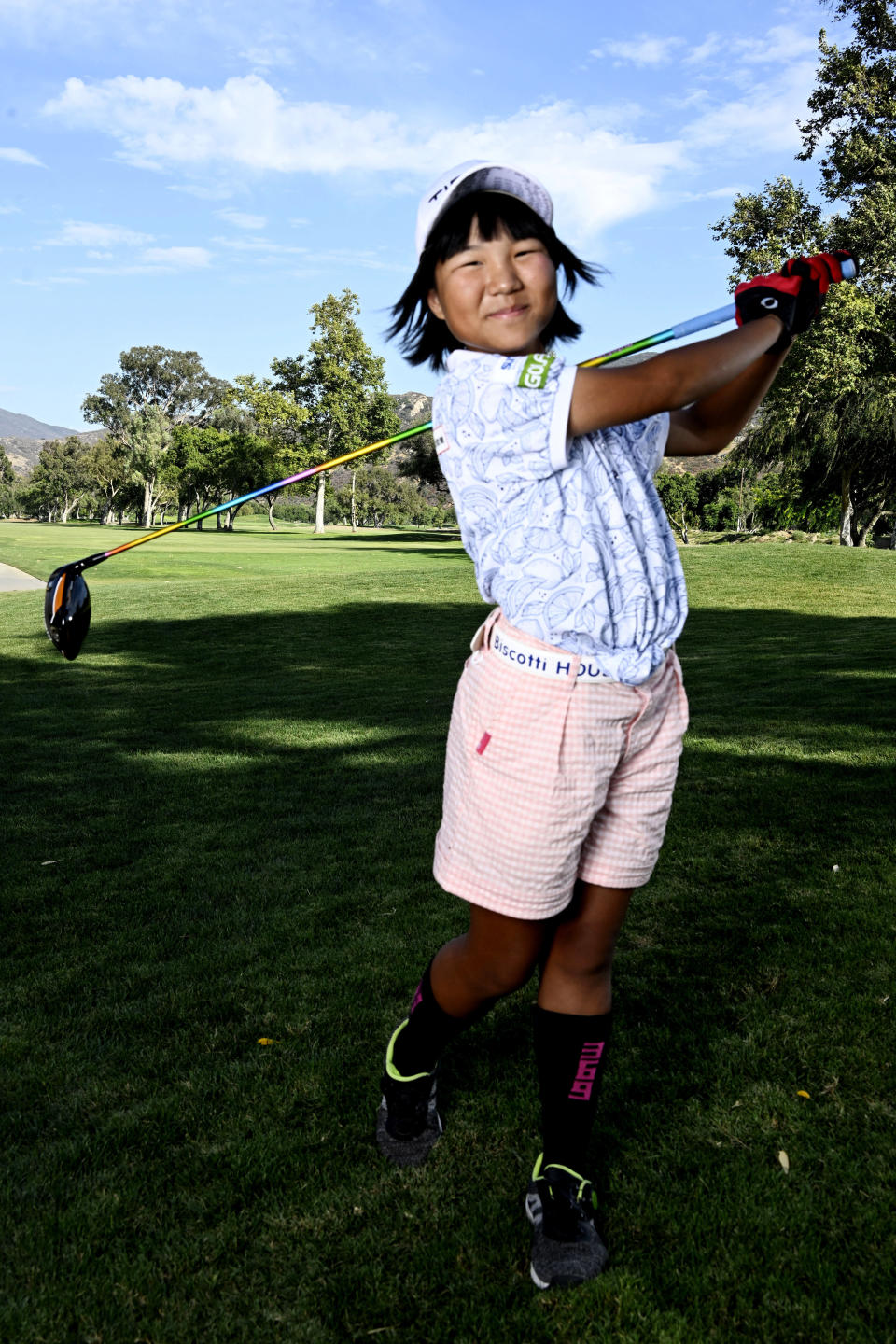 Miroku Suto poses for a photo after the final round of the Junior World Championships golf tournament at Singing Hills Golf Resort on Thursday, July 14, 2022, in El Cajon, Calif. (AP Photo/Denis Poroy)