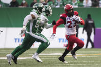 Calgary Stampeders running back William Langlais (23) runs the ball during the first half of a CFL football game against the Saskatchewan Roughriders Sunday, Nov. 28., 2021 in Regina, Saskatchewan. (Kayle Neis/The Canadian Press via AP)