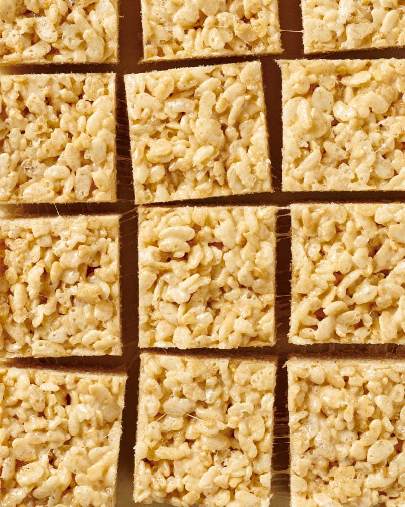 photo of cut rice krispy treats on parchment paper