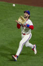 Philadelphia Phillies right fielder Bryce Harper (3) catches a fly during the fourth inning of a baseball game, Saturday, Sept. 19, 2020, in Philadelphia. (AP Photo/Laurence Kesterson)