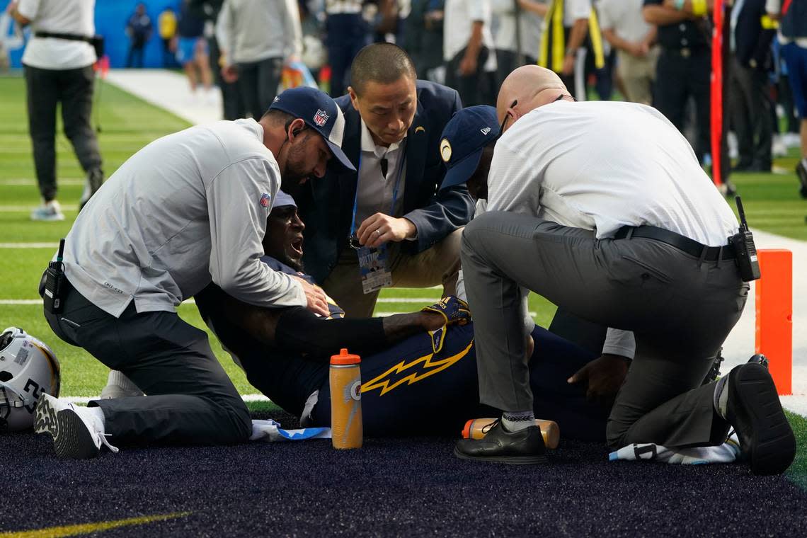 Los Angeles Chargers cornerback J.C. Jackson (27) is checked out for injury during the first half of an NFL football game against the Seattle Seahawks Sunday, Oct. 23, 2022, in Inglewood, Calif. (AP Photo/Marcio Jose Sanchez) Marcio Jose Sanchez/AP