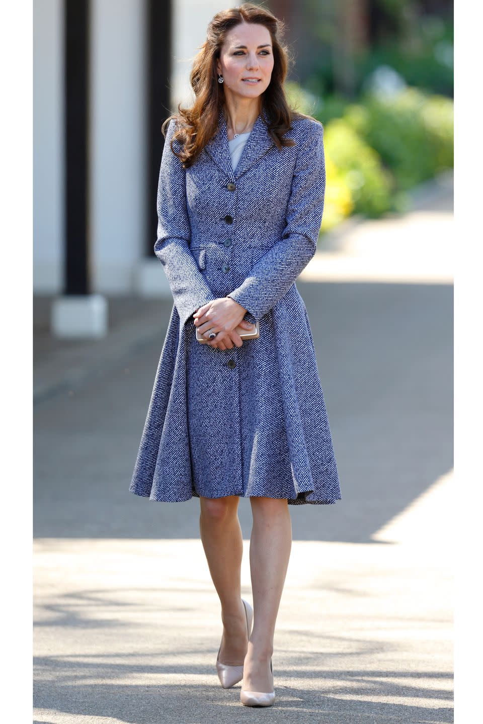 <p>The Duchess of Cambridge arrives to the Magic Garden playground opening at Hampton Court Palace wearing a gray Michael Kors coat that <a href="https://www.harpersbazaar.com/celebrity/red-carpet-dresses/g3531/kate-middleton-best-looks-australia/?slide=1" rel="nofollow noopener" target="_blank" data-ylk="slk:she previously wore back in 2014;elm:context_link;itc:0;sec:content-canvas" class="link ">she previously wore back in 2014</a> for an Anzac Day remembrance service in Australia. </p>