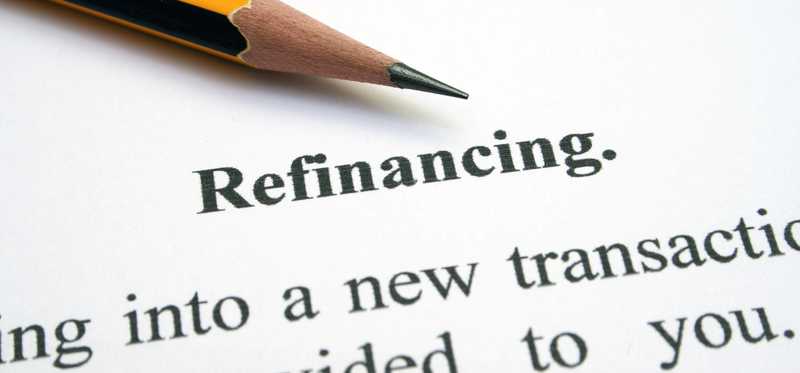 The word refinancing and a pencil.