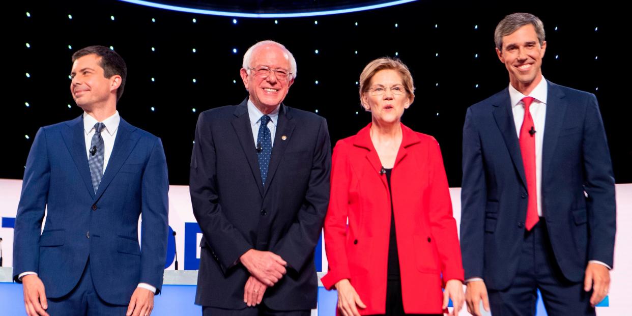 Democratic presidential hopefuls Mayor of South Bend, Indiana, Pete Buttigieg, US senator from Vermont Bernie Sanders, US Senator from Massachusetts Elizabeth Warren and US Representative for Texas' 16th congressional district Beto O'Rourke arrive for the first round of the second Democratic primary debate of the 2020 presidential campaign season hosted by CNN at the Fox Theatre in Detroit, Michigan on July 30, 2019. (Photo by Jim WATSON / AFP) (Photo credit should read JIM WATSON/AFP/Getty Images)