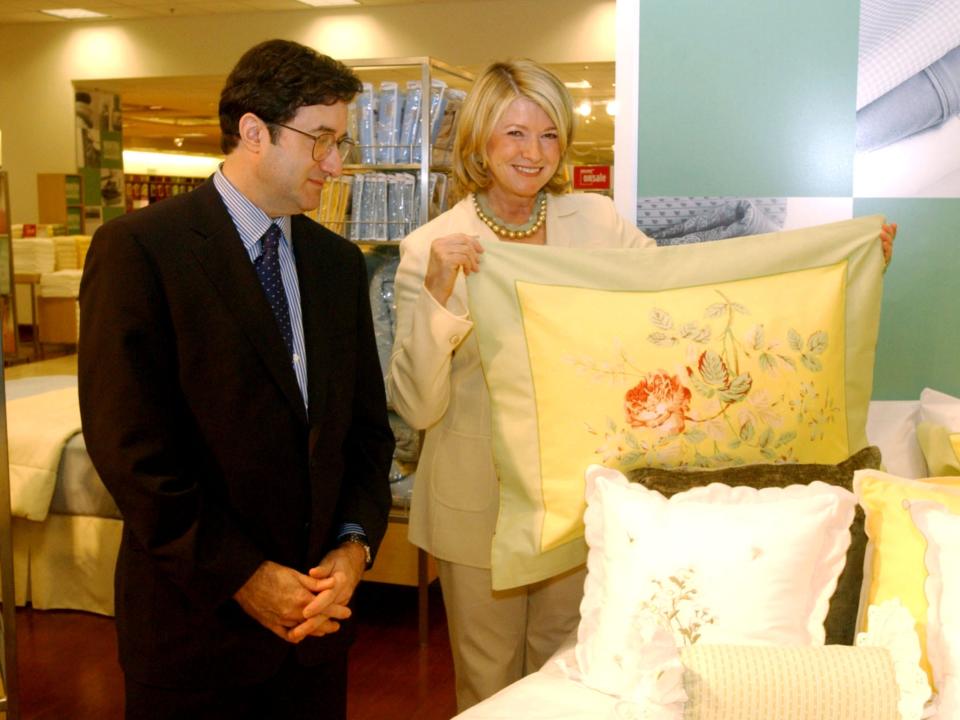 Martha Stewart displays merchandise with Mark A. Cohen, former chairman and CEO of Sears Canada, in 2003.