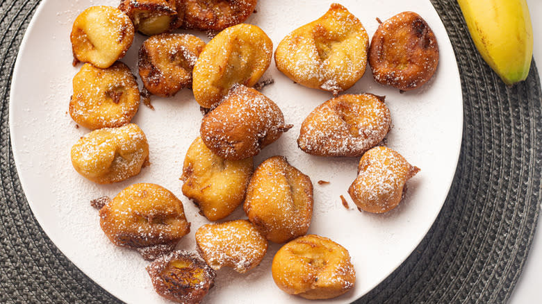 Deep-fried banana pieces on plate