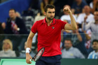 Tennis - Croatia v Argentina - Davis Cup Final - Arena Zagreb, Croatia - 25/11/16 Croatia's Marin Cilic racts after winning his match against Argentina's Federico Delbonis. REUTERS/Antonio Bronic