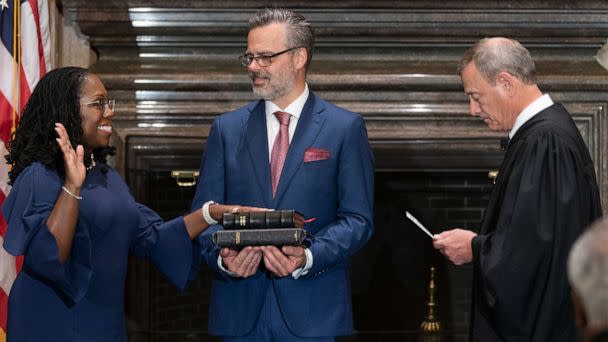 PHOTO: Chief Justice John G. Roberts, Jr., administers the Constitutional Oath to Judge Ketanji Brown Jackson in the West Conference Room, Supreme Court Building in Washington, D.C., on June 30, 2022. Dr. Patrick Jackson holds the Bible. (Fred Schilling, Collection of the Supreme Court of the United States)